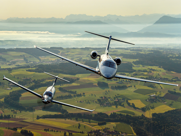 PC12 and PC24 Pilatus Airplanes over Switzerland