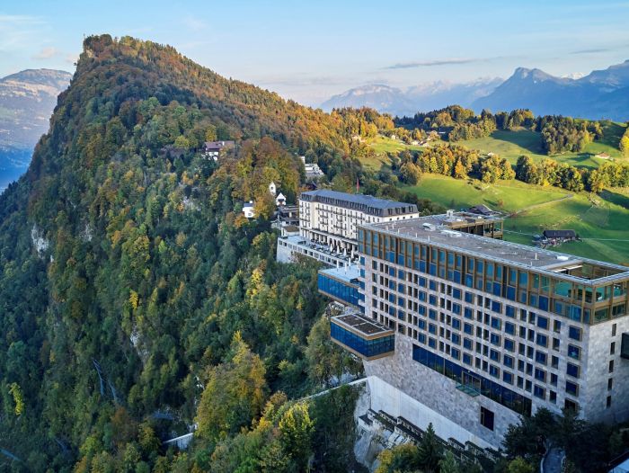 View of the Bürgenstock Resort with the Bürgenstock Hotel & Alpine Spa in the foreground, the Palace Hotel and the Hammetschwandlift in the background